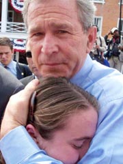 Bush hugging Ashley Faulner