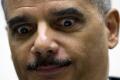 Eric Holder Puckered